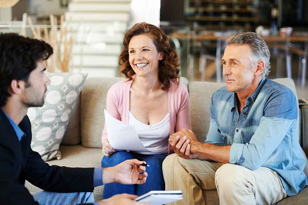 Couple speaking to a licensed Medicare Agent